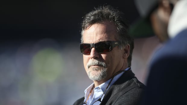 Former NFL head coach Jeff Fisher watches a game between the Birmingham Iron and Atlanta Legends in the first half at Georgia State Stadium.